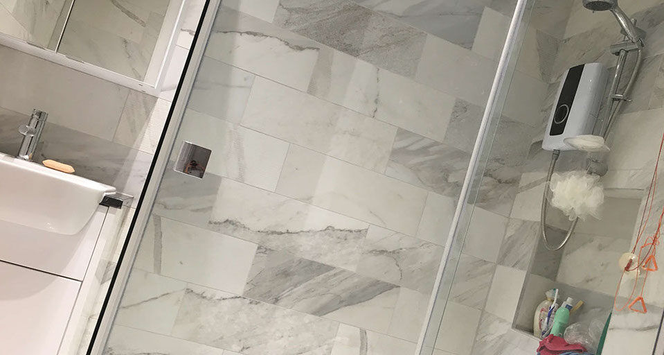 Tiled flooring by JFS Developments